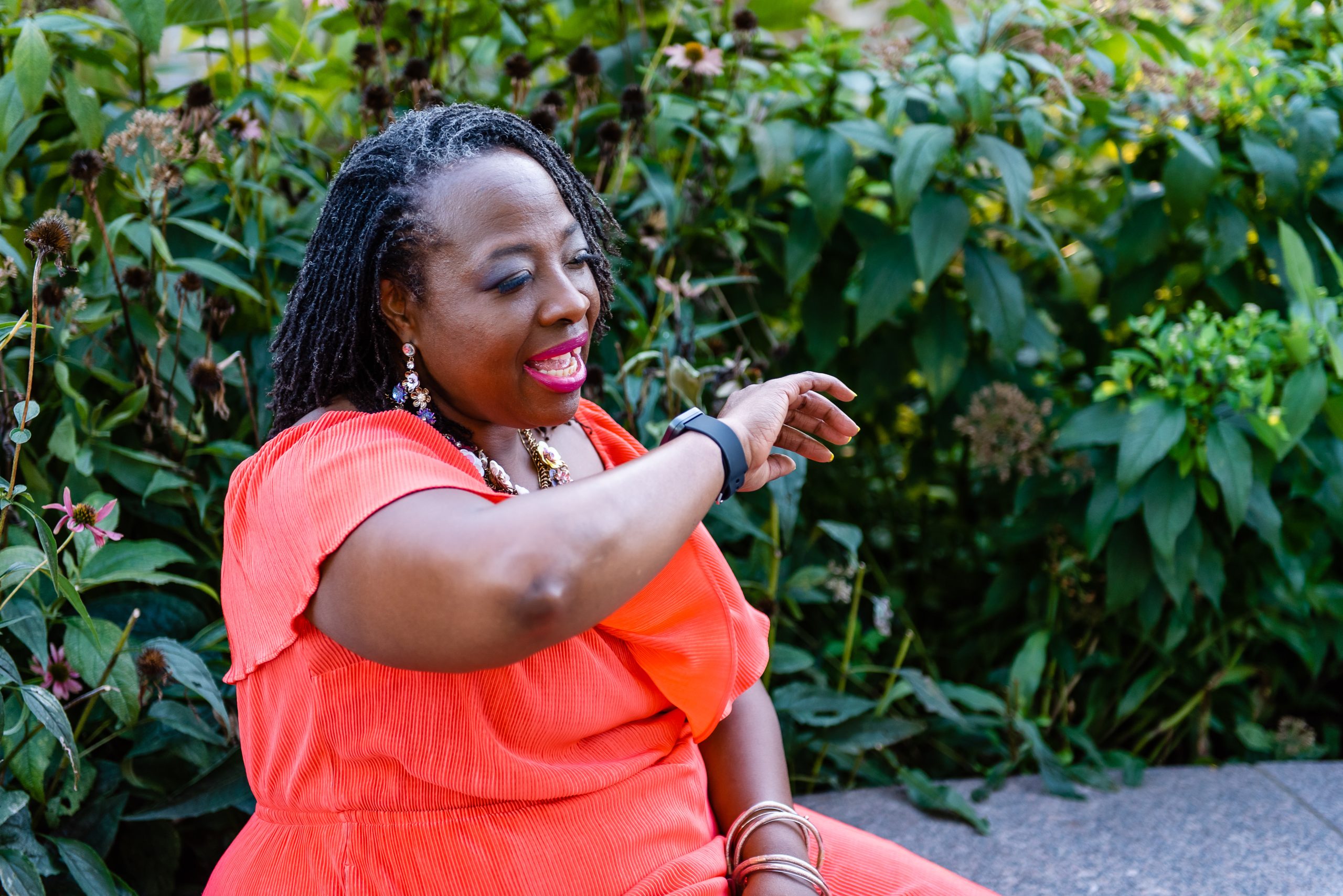 a woman in an orange dress