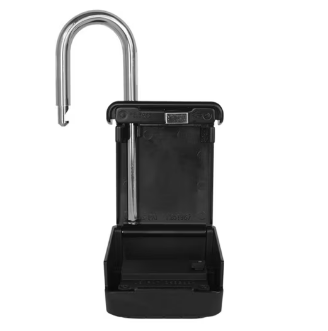 Open lockbox for medical alert system showing stored key for EMS access