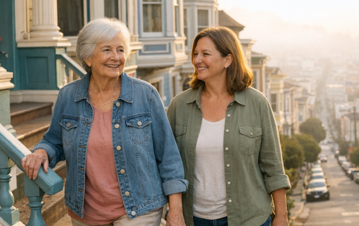 Fall prevention San Francisco: a senior woman and her adult daughter walking down the front steps of a Victorian home